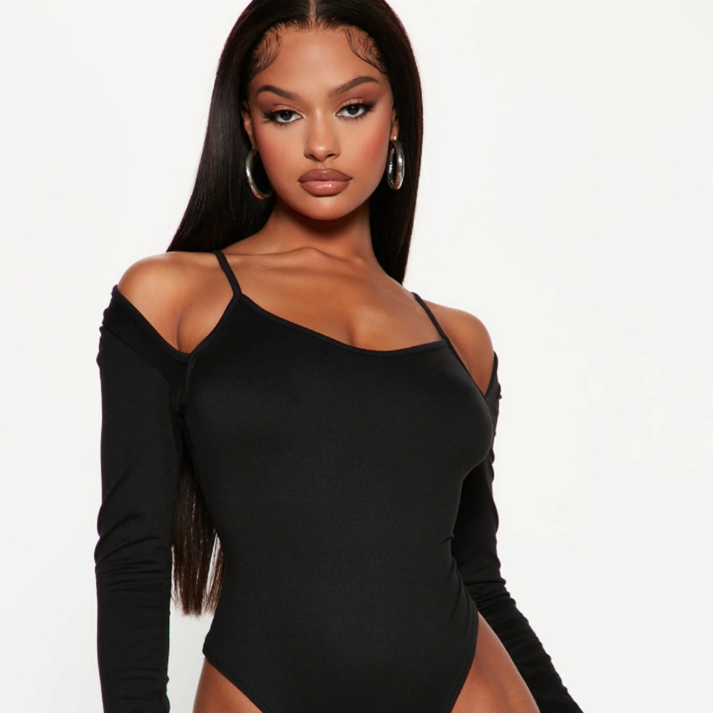 New Long Sleeve Body Suit In Black.